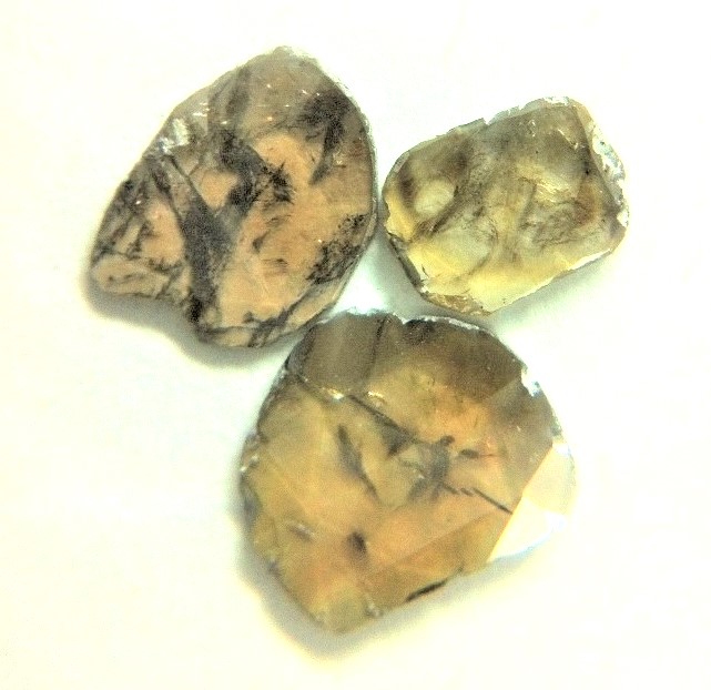 Yellow Diamond Slices with Unique Inclusions