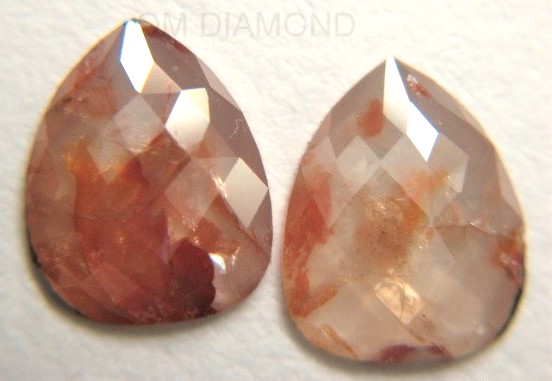 Pair of Rustic Color Pear Cut Diamonds
