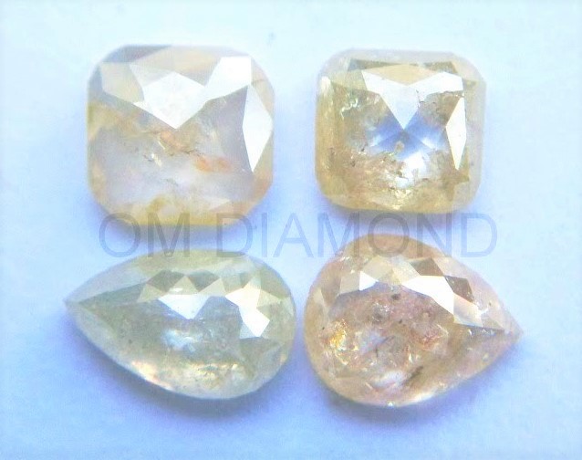 Pairs of Icy-White Fancy Shape Diamonds