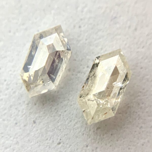 Pair of Elongated Hexagon Diamonds with Ivory Color Inclusions, Perfect for Couple's Rings