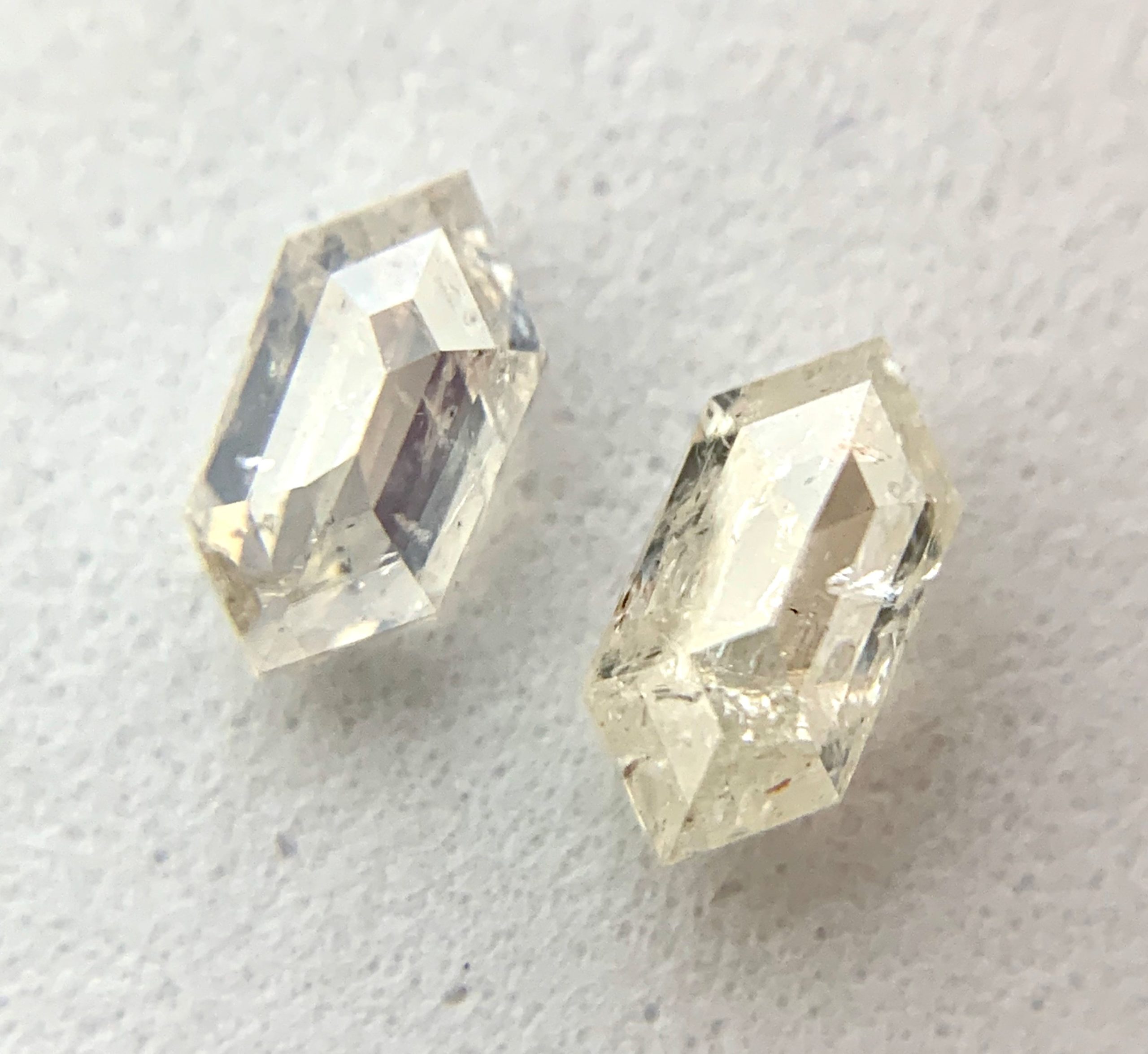 Pair of Elongated Hexagon Diamonds with Ivory Color Inclusions, Perfect for Couple's Rings